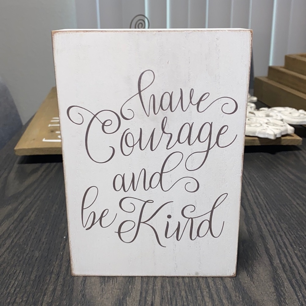 “Have courage & be kind” sign